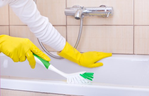 Carpet cleaner wearing PPE during a professional cleaning task